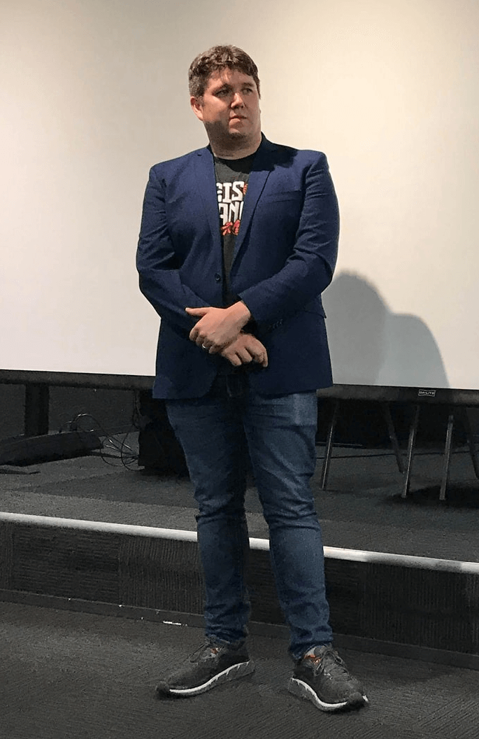 Rob Pereyda speaking on stage